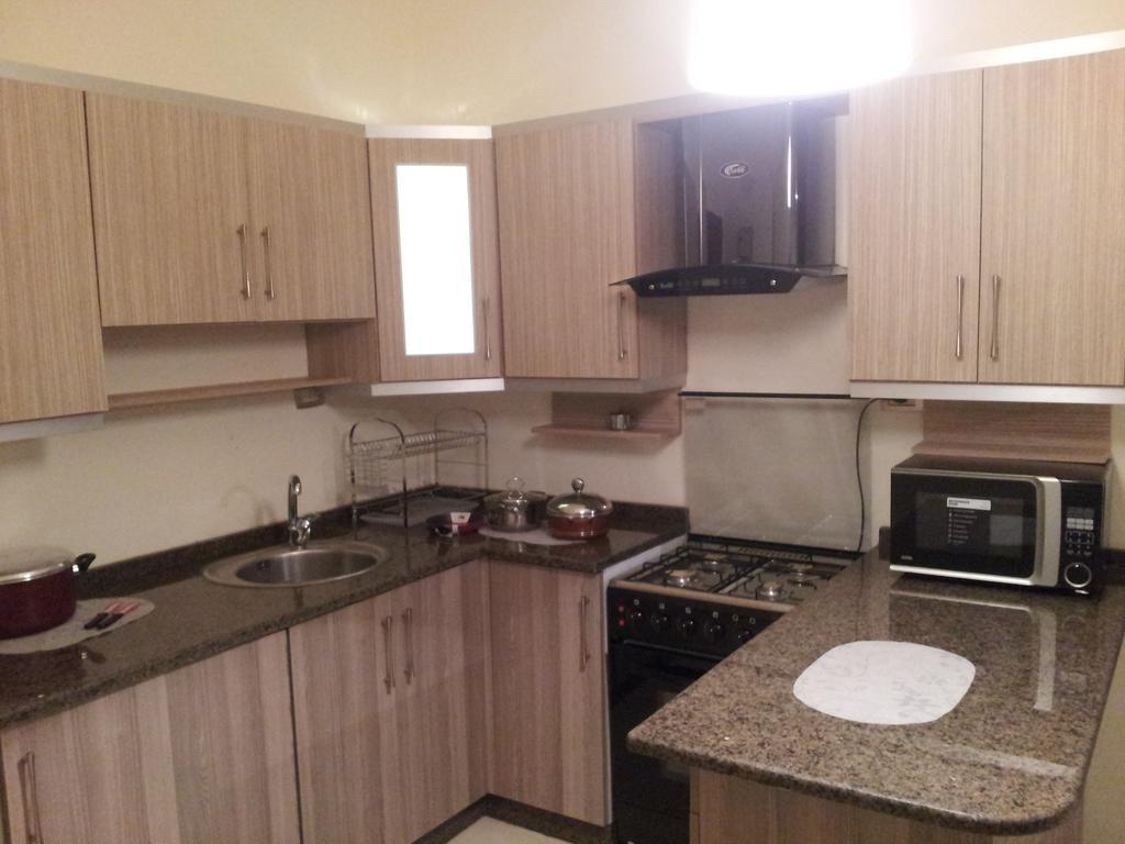 Cozy Dair Ghbar Apartment Аман Екстериор снимка