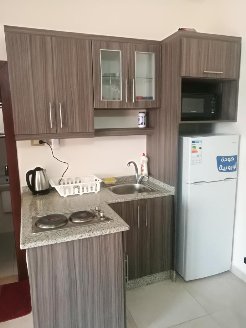 Cozy Dair Ghbar Apartment Аман Екстериор снимка