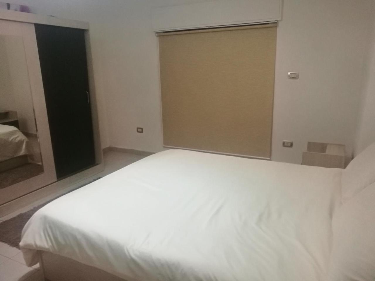 Cozy Dair Ghbar Apartment Аман Екстериор снимка